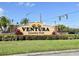 Ventura Country Club entrance sign with tropical landscaping and sunny blue skies at 3984 Atrium Dr # 4, Orlando, FL 32822
