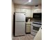 Functional kitchen featuring appliances and ample cabinet space for storage and food preparation at 3984 Atrium Dr # 4, Orlando, FL 32822