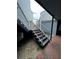 Exterior view of a stairwell leading to an upper level at 3984 Atrium Dr # 4, Orlando, FL 32822
