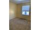 Bright bedroom with carpeted floor and window coverings at 4372 Paradise Cove Ct, Kissimmee, FL 34746
