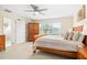 Spacious bedroom with large window and ensuite bathroom at 438 Birkdale St, Davenport, FL 33897