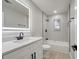 Modern bathroom featuring a quartz vanity and walk-in shower at 4505 Haylock Dr, Orlando, FL 32807