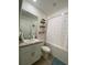 Clean bathroom with a bathtub, vanity, and shower at 46 Willow Ln, Kissimmee, FL 34759