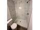 Shower stall with marble-style tile and modern fixtures at 5920 Nw 65Th St, Ocala, FL 34482