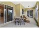 Relaxing screened porch with patio furniture and sliding glass doors at 6191 Oak Shore Dr, Saint Cloud, FL 34771