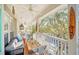 Relaxing balcony with outdoor seating and treetop views at 651 Celebration Ave # 651, Celebration, FL 34747