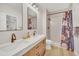 Modern bathroom with double vanity, walk-in shower, and stylish fixtures at 651 Celebration Ave # 651, Celebration, FL 34747