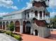 Unique building with a tower and stairs at 651 Celebration Ave # 651, Celebration, FL 34747