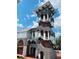 Unique building with a tower and stairs at 651 Celebration Ave # 651, Celebration, FL 34747