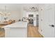 Modern white kitchen with marble countertops and stainless steel appliances at 651 Celebration Ave # 651, Celebration, FL 34747