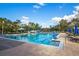 Community pool with ample deck space and seating at 651 Celebration Ave # 651, Celebration, FL 34747