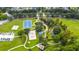 Aerial view of community park with basketball court and playground at 7136 Red Lantern Dr # 7136, Harmony, FL 34773