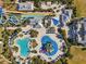 Aerial view of resort-style pool, water park, and community clubhouse at 7430 Marker Ave, Kissimmee, FL 34747