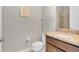 Clean bathroom with granite vanity and shower/tub combo at 7430 Marker Ave, Kissimmee, FL 34747