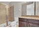 Small bathroom with shower and granite vanity at 7430 Marker Ave, Kissimmee, FL 34747