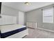 Bedroom with white bed frame and dresser at 7430 Marker Ave, Kissimmee, FL 34747