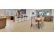 Open concept dining area with kitchen and living room views at 7430 Marker Ave, Kissimmee, FL 34747