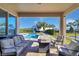 Relaxing patio with seating, fire pit and pool view at 7430 Marker Ave, Kissimmee, FL 34747