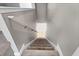 Carpeted staircase leading to the lower level at 7430 Marker Ave, Kissimmee, FL 34747
