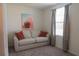 Bedroom with a sofa and large window providing natural light at 800 Benoi Dr, Davenport, FL 33896