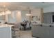 Open concept dining room with seating for eight at 800 Benoi Dr, Davenport, FL 33896