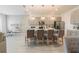 Open concept kitchen with island and breakfast bar at 800 Benoi Dr, Davenport, FL 33896