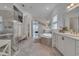 Elegant bathroom boasting a soaking tub, walk-in shower, and and vanities at 820 Windlass Ct, Kissimmee, FL 34746
