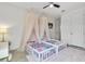 Charming bedroom with twin beds and canopy accents at 820 Windlass Ct, Kissimmee, FL 34746