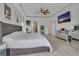 Spacious primary bedroom with large bed, TV, and plenty of natural light at 820 Windlass Ct, Kissimmee, FL 34746