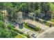 Community entrance with signage, clock tower, and landscaping at 820 Windlass Ct, Kissimmee, FL 34746