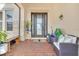 Inviting front porch with seating and brick flooring at 820 Windlass Ct, Kissimmee, FL 34746