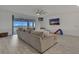 Bright Gathering room with sectional sofa and balcony access at 820 Windlass Ct, Kissimmee, FL 34746