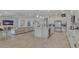 Bright, open kitchen featuring a large island and stainless steel appliances at 820 Windlass Ct, Kissimmee, FL 34746