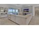 Spacious living room with large sectional sofa and sliding glass doors at 820 Windlass Ct, Kissimmee, FL 34746