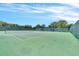 Two tennis courts with nets and surrounding fence at 820 Windlass Ct, Kissimmee, FL 34746
