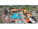 Aerial view of community pool and building at 1375 Tuscana Ln # 1106, Davenport, FL 33896