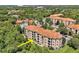 Aerial view of condo building showcasing its exterior at 1375 Tuscana Ln # 1106, Davenport, FL 33896