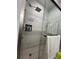 Bathroom with a walk-in shower and modern fixtures at 1375 Tuscana Ln # 1106, Davenport, FL 33896