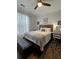 Comfortable bedroom with a king-size bed and workspace at 1375 Tuscana Ln # 1106, Davenport, FL 33896