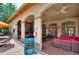 Outdoor seating area adjacent to the community bar at 1375 Tuscana Ln # 1106, Davenport, FL 33896