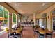 Relaxing community bar with indoor and outdoor seating at 1375 Tuscana Ln # 1106, Davenport, FL 33896