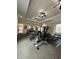 Community gym with cardio and weight equipment at 1375 Tuscana Ln # 1106, Davenport, FL 33896