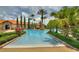 Large resort-style pool with plenty of lounge chairs at 1375 Tuscana Ln # 1106, Davenport, FL 33896