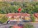 Aerial view of townhome building and parking lot at 1017 Park Ridge Cir, Kissimmee, FL 34746