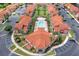 Aerial view of community pool and surrounding buildings at 1017 Park Ridge Cir, Kissimmee, FL 34746