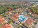Aerial view of a townhome community with pool and lush landscaping at 1017 Park Ridge Cir, Kissimmee, FL 34746