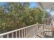 Private balcony overlooking a lush, green backyard at 1017 Park Ridge Cir, Kissimmee, FL 34746