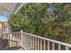 Private balcony with tranquil wooded views at 1017 Park Ridge Cir, Kissimmee, FL 34746