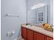 Guest bathroom with single sink vanity at 1017 Park Ridge Cir, Kissimmee, FL 34746