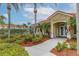 Community clubhouse with landscaping and signage at 1017 Park Ridge Cir, Kissimmee, FL 34746